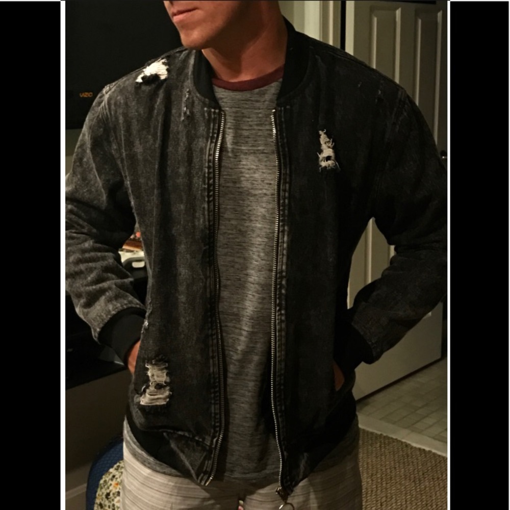 1980-style bomber jacket; black-washed denim.